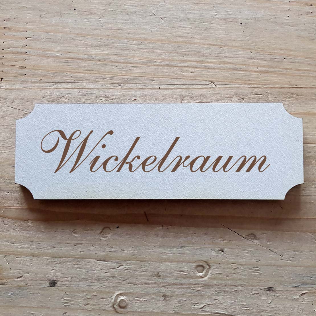 Selbstklebendes Schild « Wickelraum »